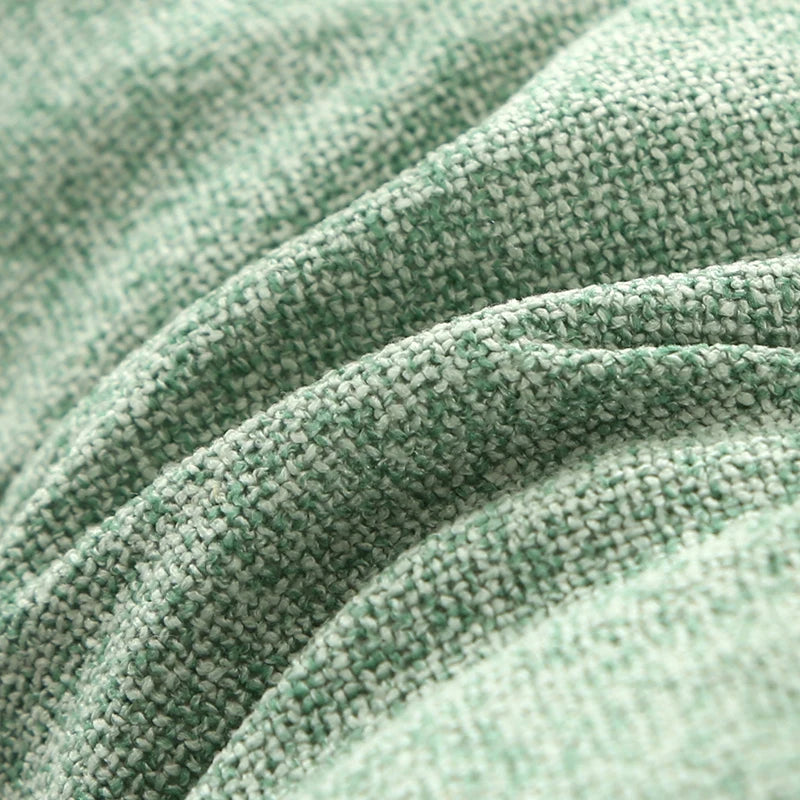 Gros plan sur la texture du tissu épais du coussin de chaise, finition tissée douce et résistante